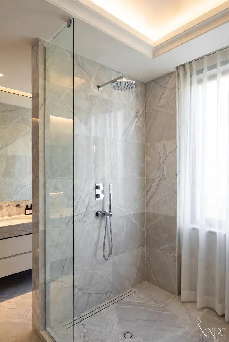 Frameless fixed shower glass panel — walk-in style